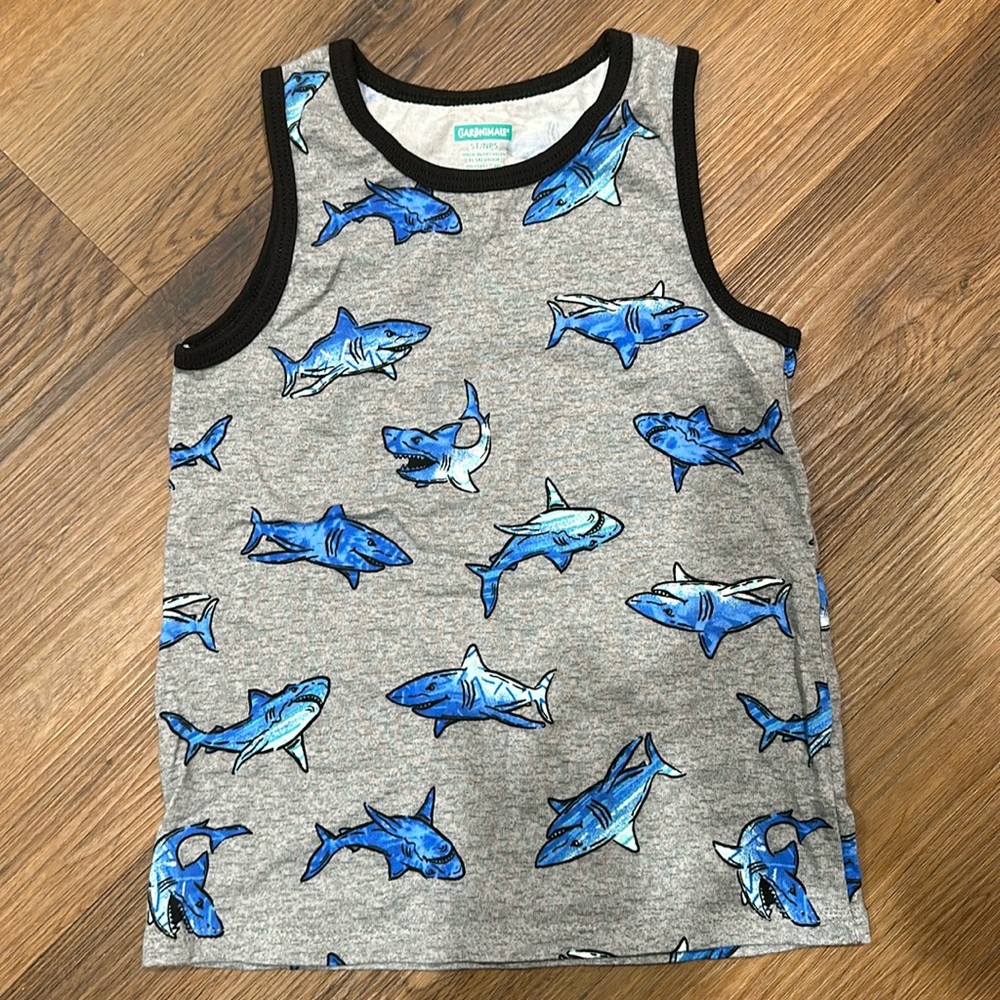Boy beach shirt with sharks on it.